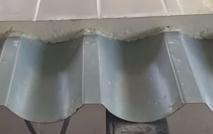 Solape trasnversal del panel sandwich teja